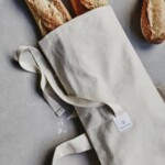 reusable baguette bag with bread