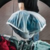 Model Demonstrating Full Guppyfriend Laundry Wash Bag