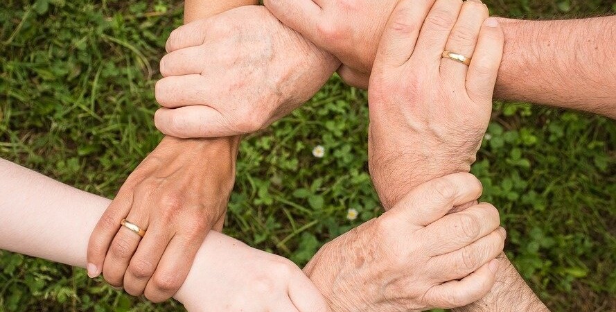 people holding hands