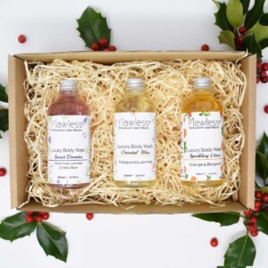 Set of three Flawless luxury body washes in a straw gift box