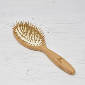 Eco Living Oval Bamboo Hairbrush With Wooden Pins Side View