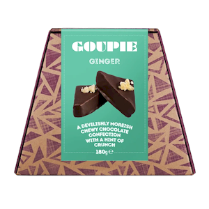 Goupie Ginger chocolate in a trapezoidal cardboard box with a teal label, featuring triangular dark chocolate pieces.